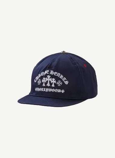 Chrome Hearts navy gas station triple cross trucker hat with white cross logos and mesh back panel.