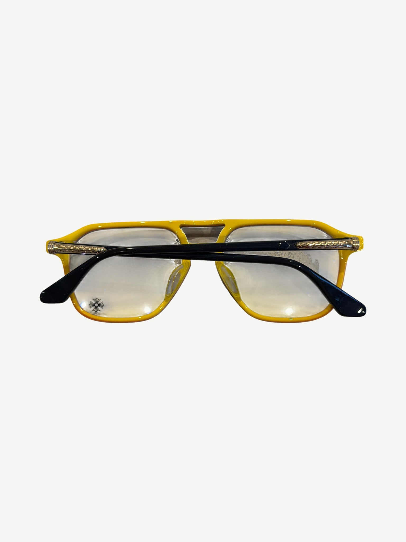 Chrome Hearts Zipher aviator glasses folded showing orange front rim, black temples and silver engraved hardware