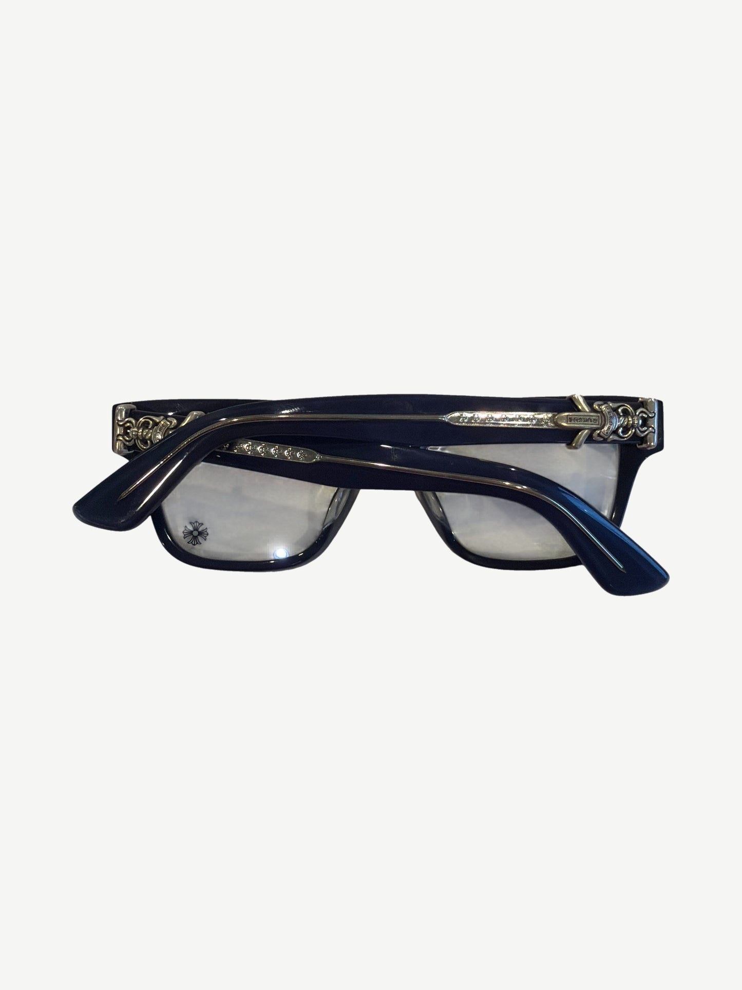 Chrome Hearts Vagillionaire glasses top view folded showing silver cross engraved temple arms detail
