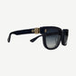 Chrome Hearts Sitonit navy sunglasses angled view showing silver CH cross hardware on temples.