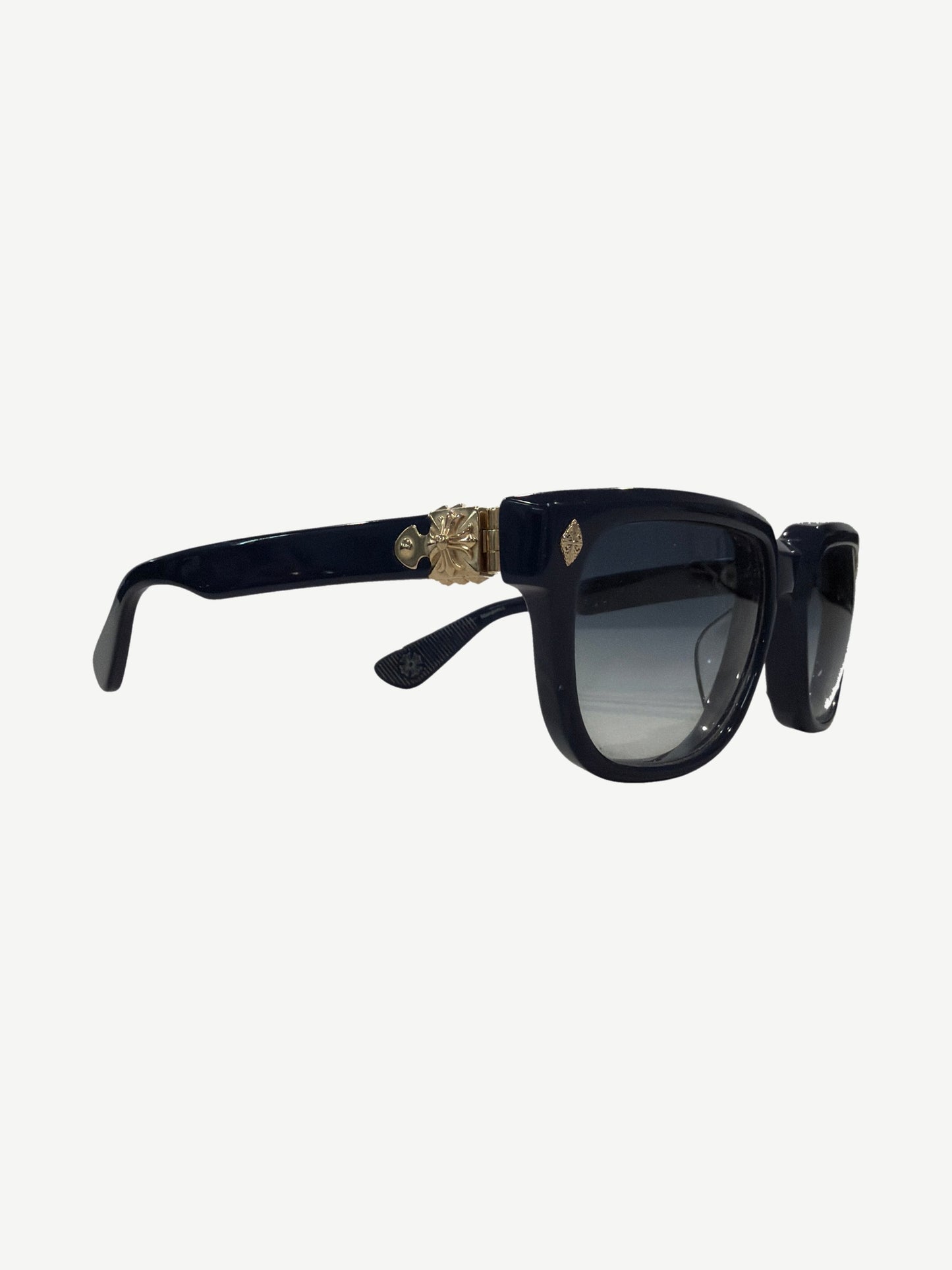 Chrome Hearts Sitonit navy sunglasses angled view showing silver CH cross hardware on temples.