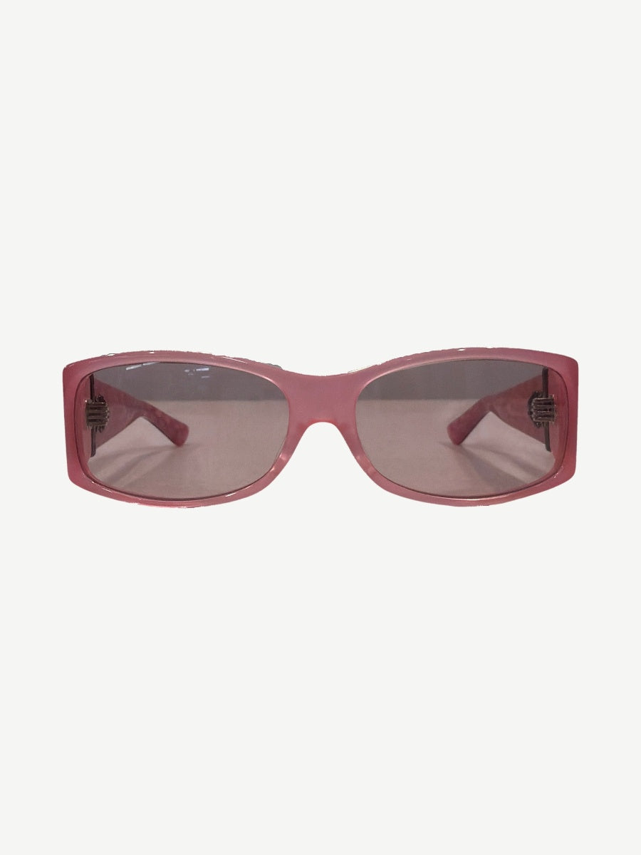 Chrome Hearts Matty Boy Ulein pink sunglasses front view with tinted rose lenses and silver hinge accents.