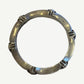 Chrome Hearts Plus and Bone ring top-down view highlighting interior stamp and CH cross accents.