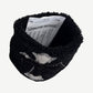Chrome Hearts black sweatband detail close up of cowhide cross patch with white outline embroidery