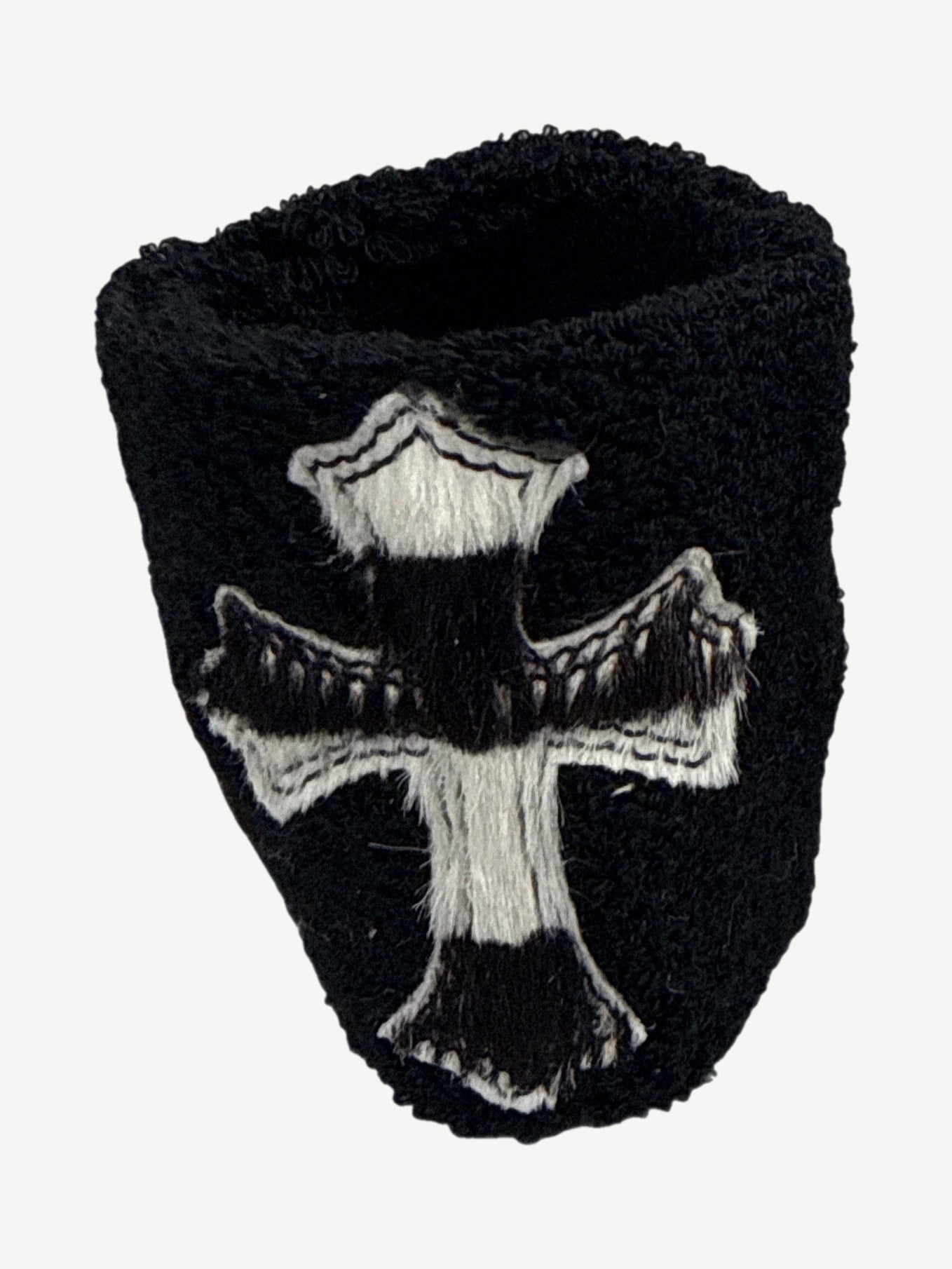 Chrome Hearts black terry cloth wristband with applied pony hair cross patch and topstitched outline