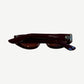 Chrome Hearts red Edenbox sunglasses side profile showing silver cross hardware at temples and burgundy arms.