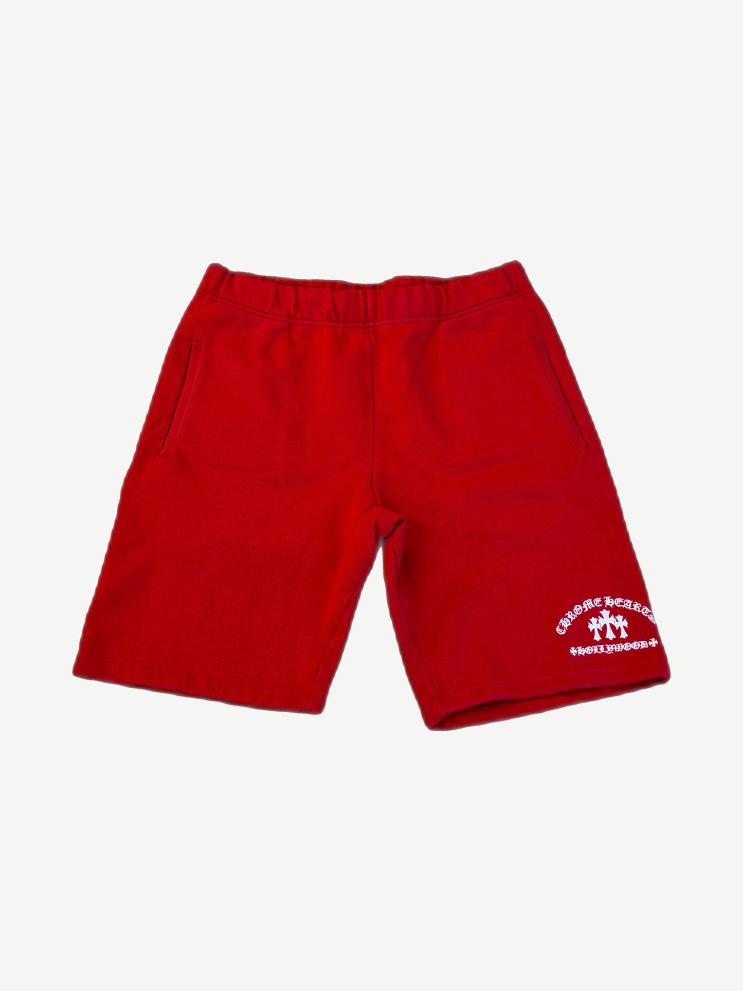 Chrome Hearts red Hollywood triple cross sweat shorts with white embroidered Hollywood cross logo on leg.