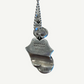Back of Chrome Hearts Rolling Stones silver pendant with Chrome Hearts 925 2002 hallmark engraving