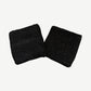 Chrome Hearts Rolling Stones sweatbands set reverse view showing plain black terry cloth backside pair.