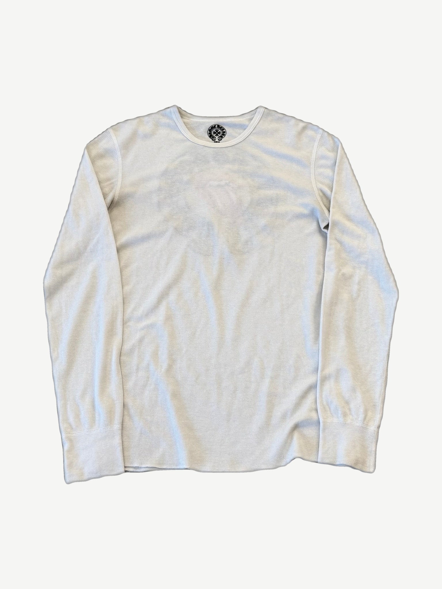 Chrome Hearts Rolling Stones cream waffle thermal long sleeve with small CH cross patch at neckline, front