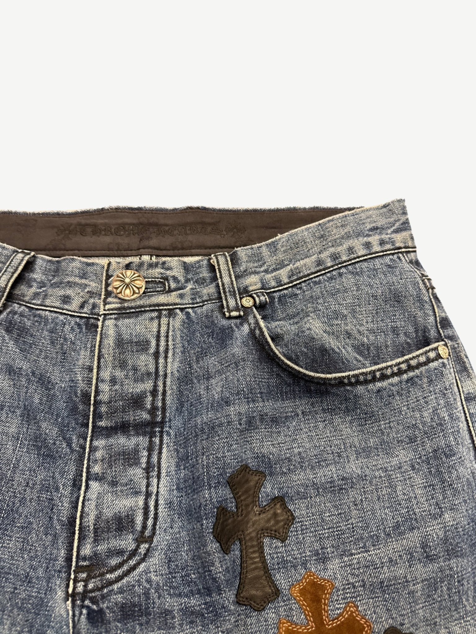 Chrome Hearts Turbo Diesel jeans detail of leather cross patch and contrast stitching