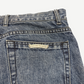 Chrome Hearts Turbo Diesel denim jeans waistband detail with branded leather logo patch close-up