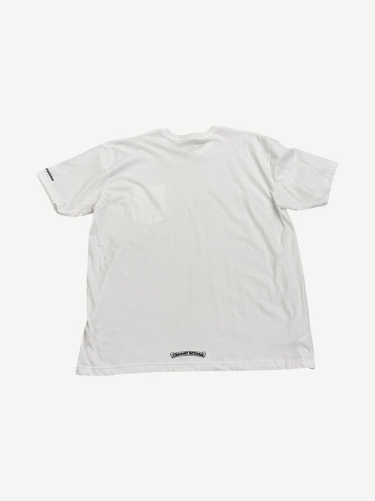 Back view of Chrome Hearts white pocket tee with small black Chrome Hearts banner logo at lower hem
