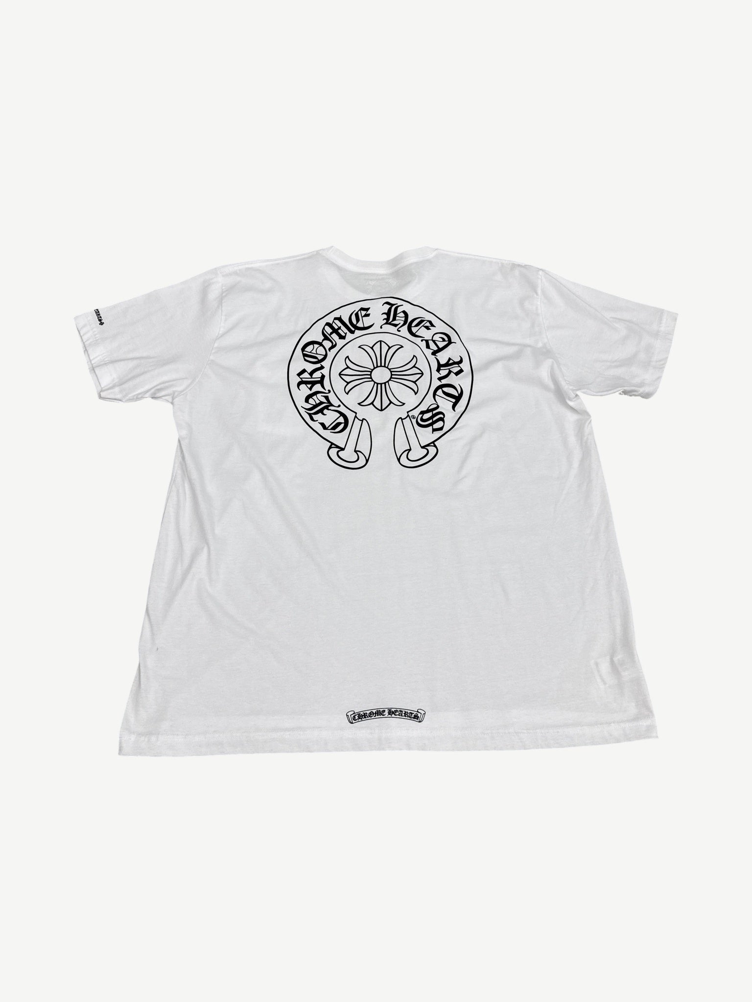 Chrome Hearts white tee back with large black horseshoe gothic logo and floral cross center print