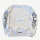 Back of Chrome Hearts white Love You crewneck showing matching floral cross sleeve prints and logo tag.