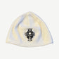 Chrome Hearts white thermal knit skull cap, waffle ribbed beanie with embroidered black cross patch
