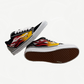 Custom Vans Knu Skool studio view with sparkling rhinestone flame side stripe over black suede sneaker upper