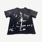 Back of Enfants Riches Deprimes faded black tee with white handwritten scrawl and ballerina figure print