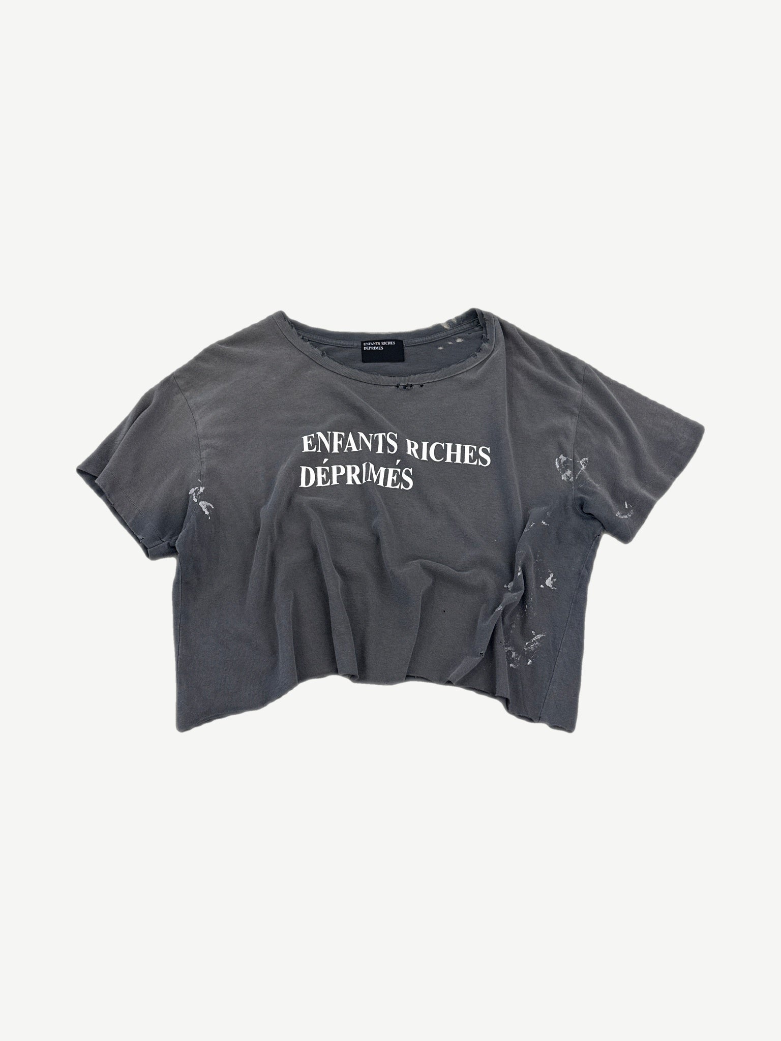 Enfants Riches Deprimes gray cropped tee with white logo print and distressed paint-splattered finish