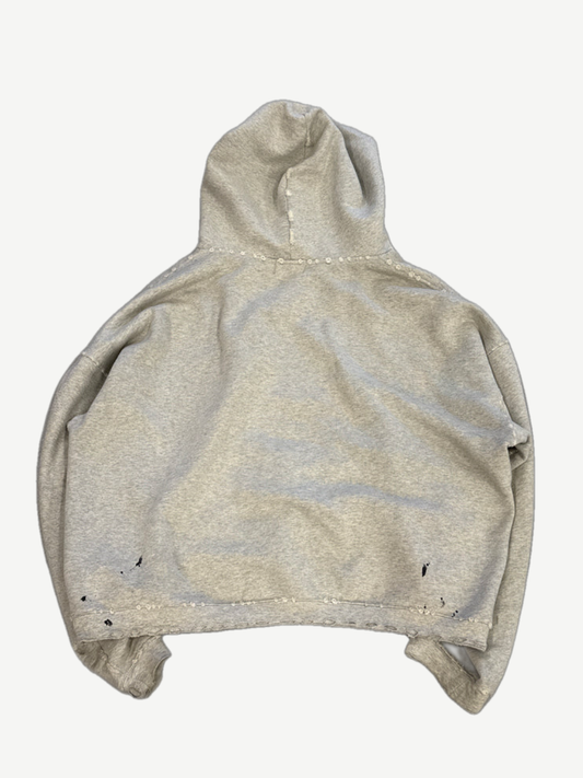 Enfants Riches Deprimes heather gray hoodie back view with allover distressing and worn raw edges.