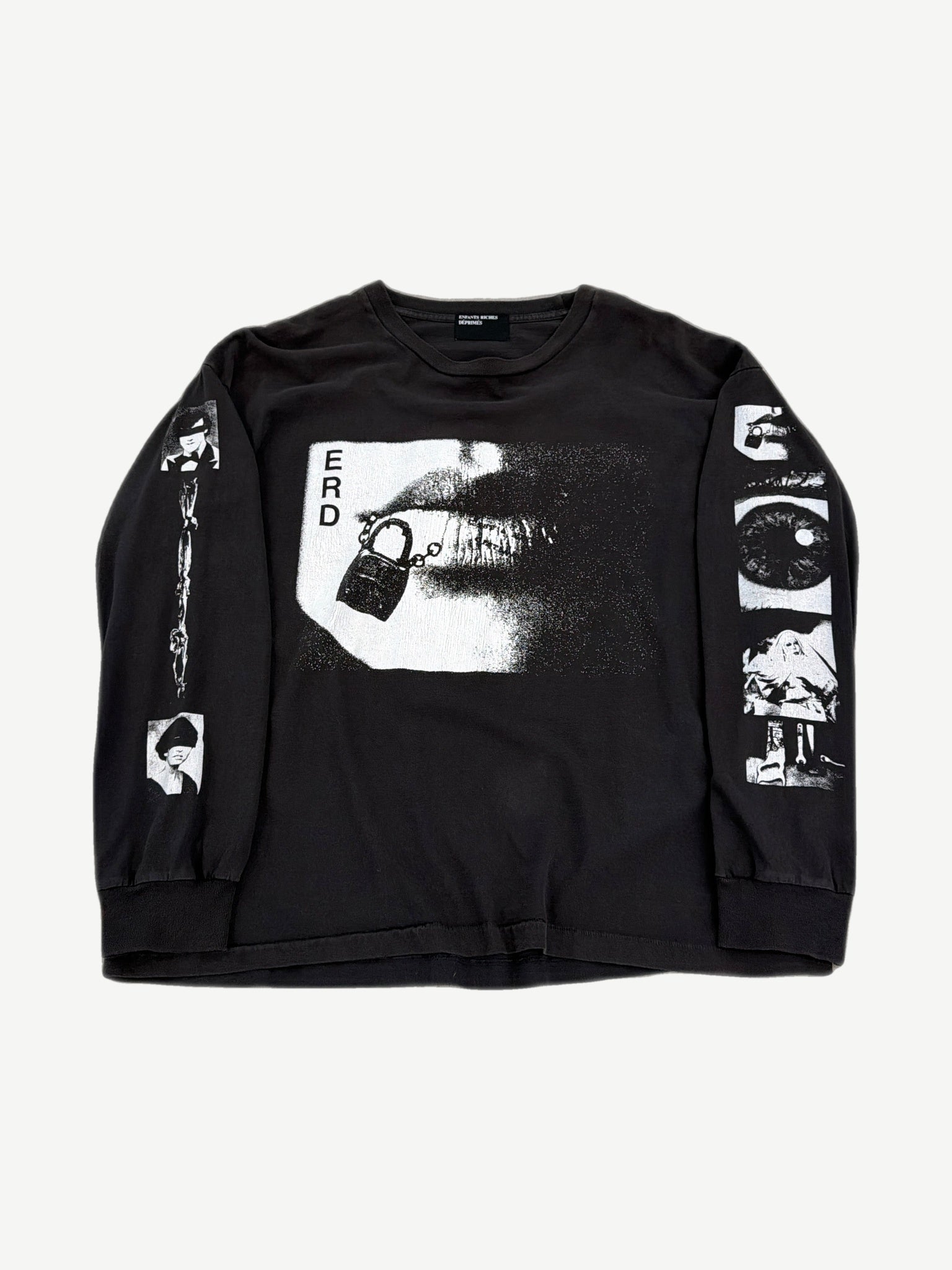 Enfants Riches Deprimes white cotton longsleeve with red lips graphic and hand-scrawled black text across chest.