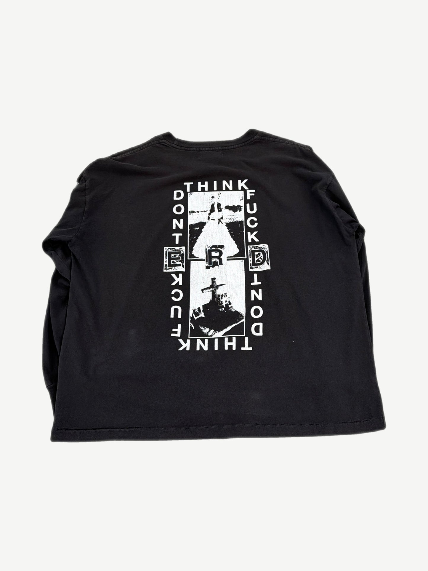 Back view of Enfants Riches Deprimes Lips longsleeve in cream cotton with faint print bleed-through showing.