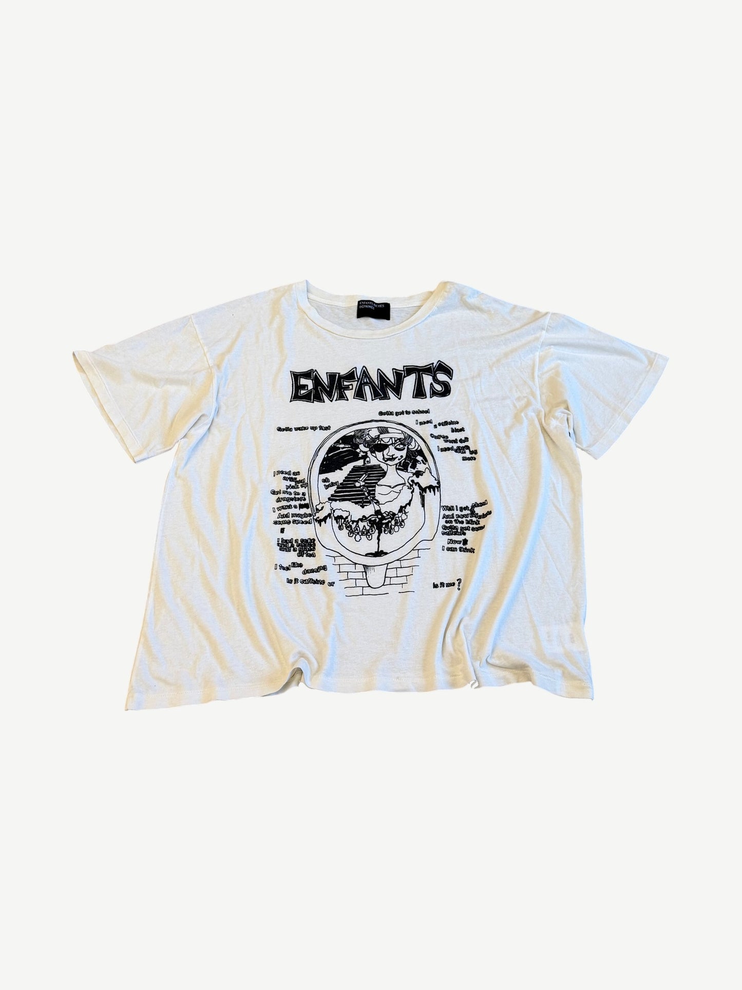 Enfants Riches Deprimes cream Melancholy tee with black Enfants graphic and hand-scrawled lyric text print.