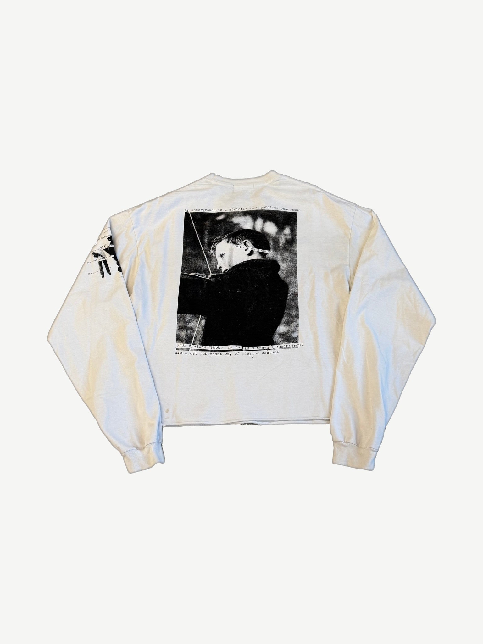 ERD off-white longsleeve back with black-and-white archer child photo and My Underground typewriter manifesto print.