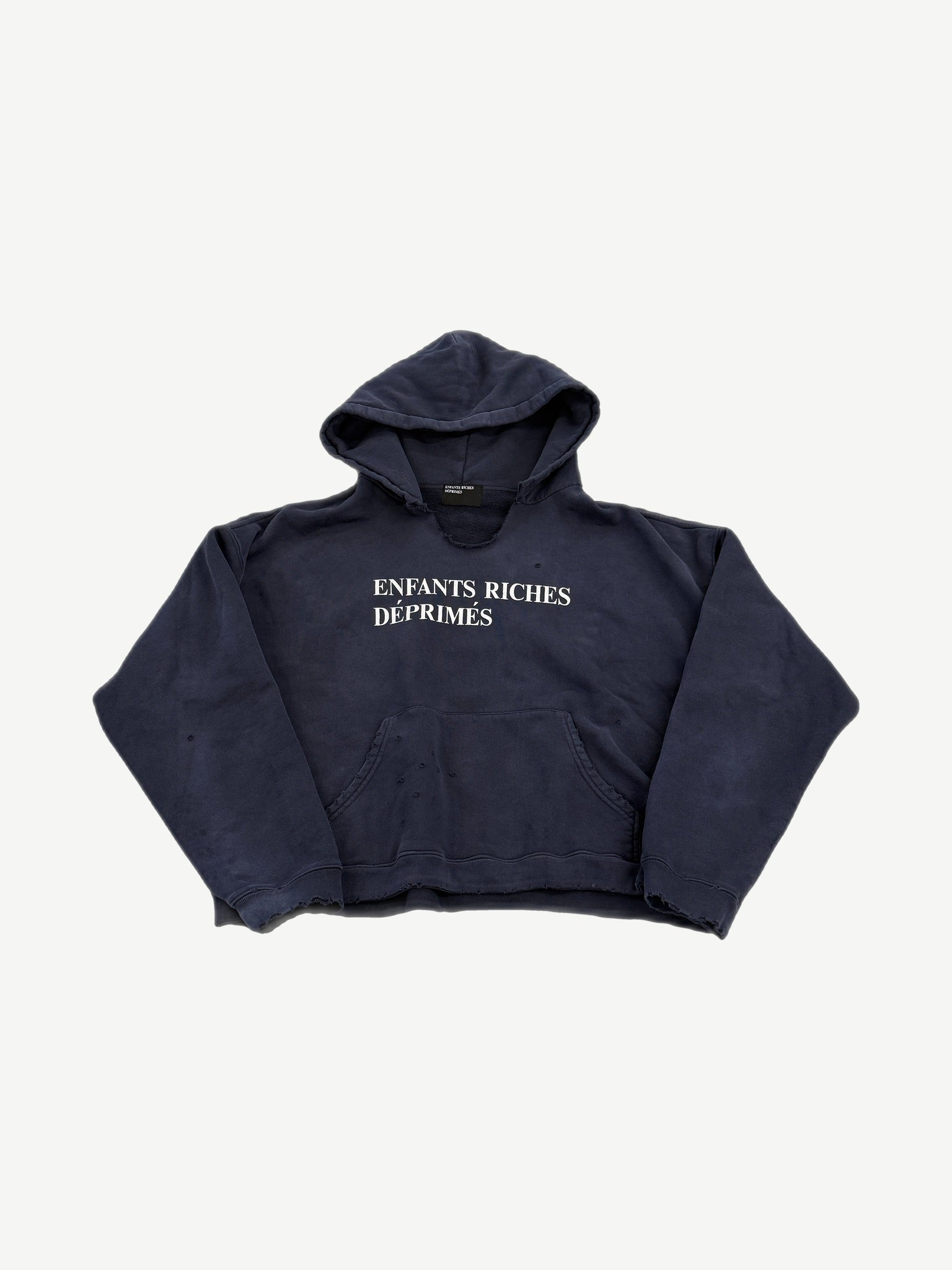 Enfants Riches Deprimes navy distressed hoodie front with white serif logo print and pinhole damage detail