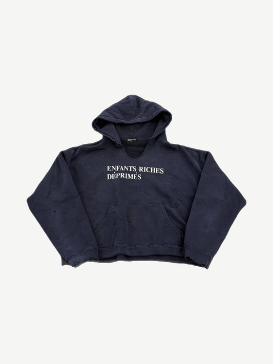 Enfants Riches Deprimes navy distressed hoodie front with white serif logo print and pinhole damage detail