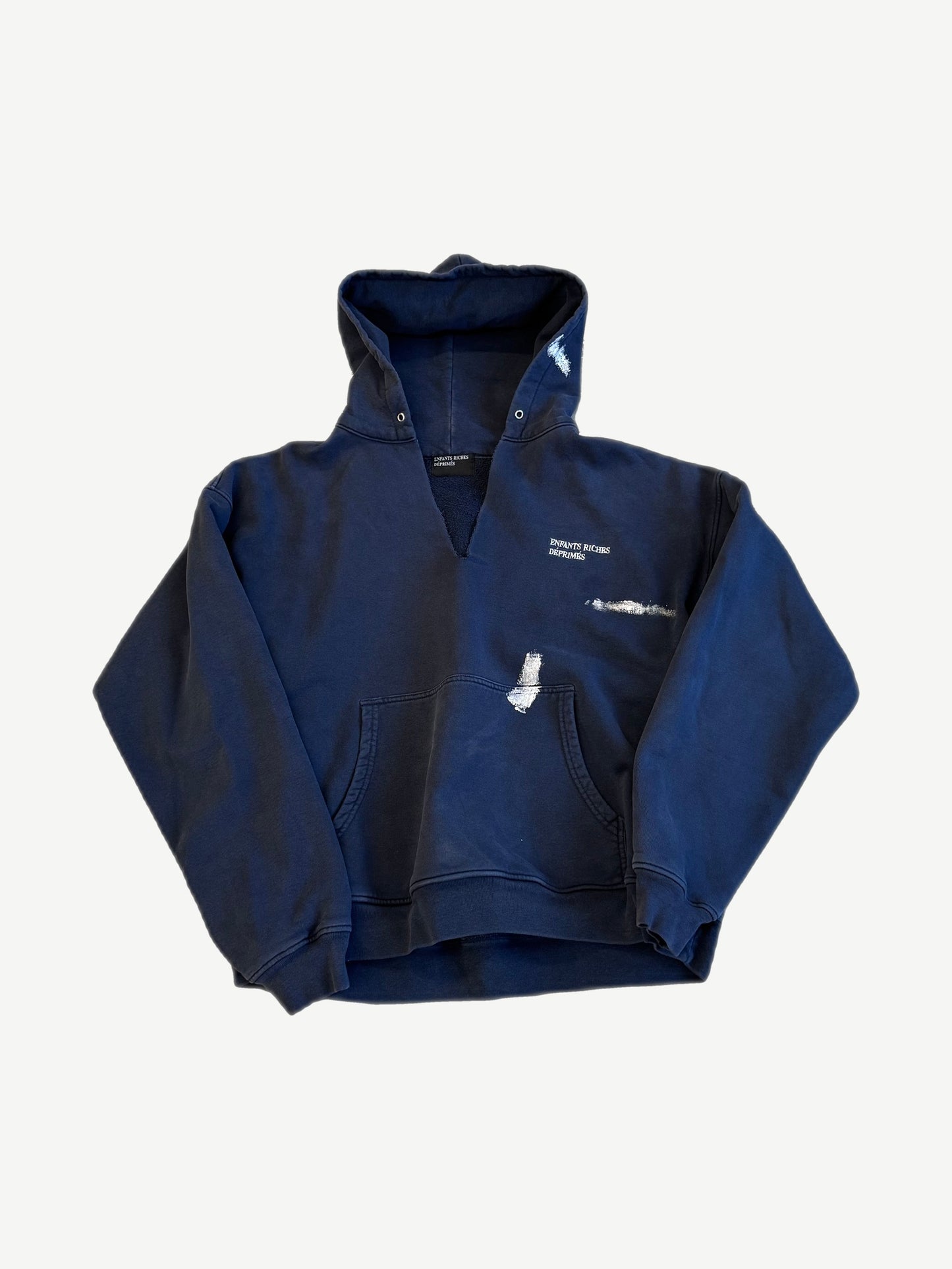 Enfants Riches Deprimes navy hoodie front with hand painted white logo and pen stroke chest details.