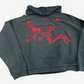 Enfants Riches Deprimes Psychotherapie hoodie cropped back view in washed black with detailed red graphic print
