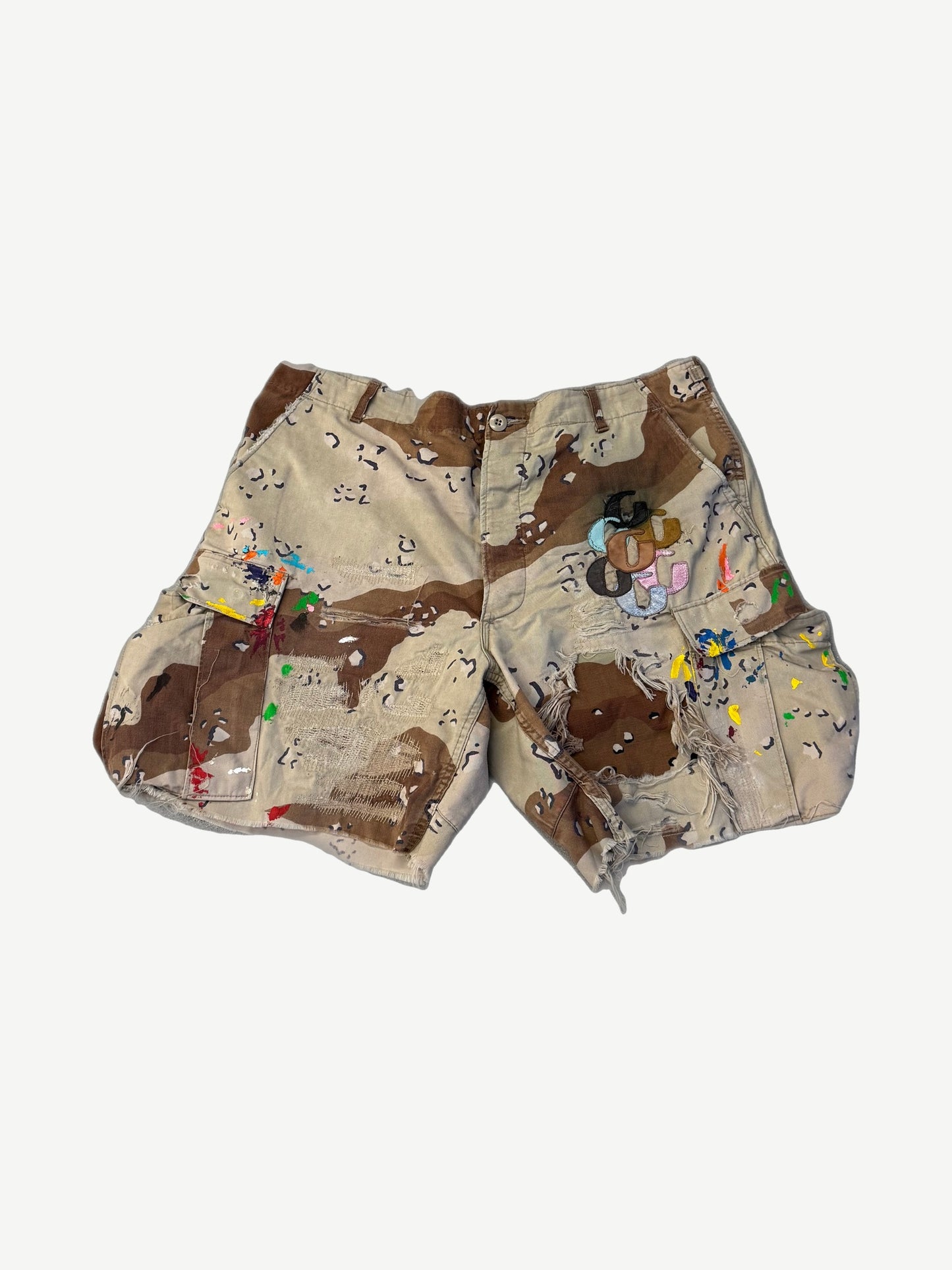 Gallery Dept chocolate chip camo cargo shorts with rainbow paint splatter and G patch on thigh
