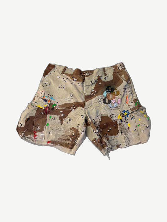 Gallery Dept chocolate chip camo cargo shorts with rainbow paint splatter and G patch on thigh