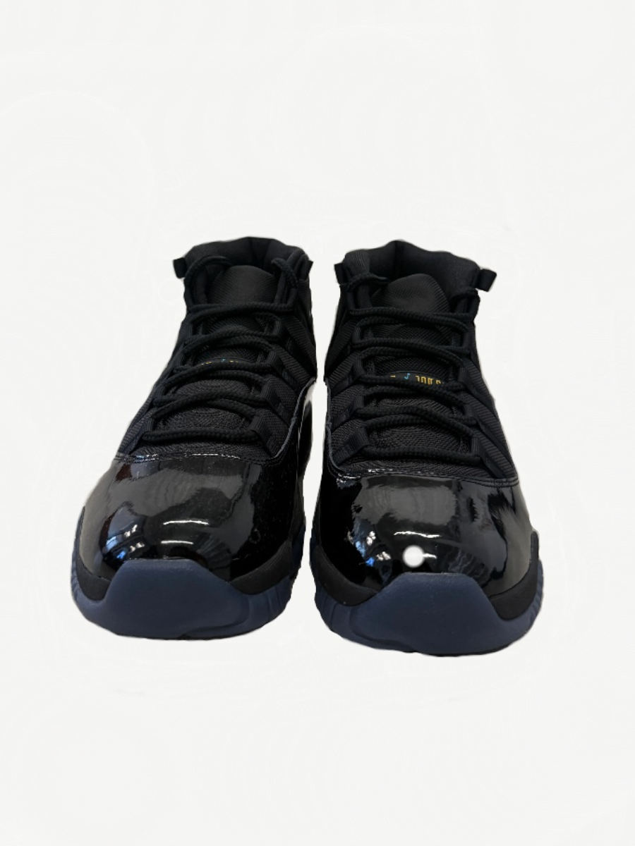 Jordan 11 Retro Gamma Blue sneaker pair top view with white midsole, black mesh and blue accent stitching.