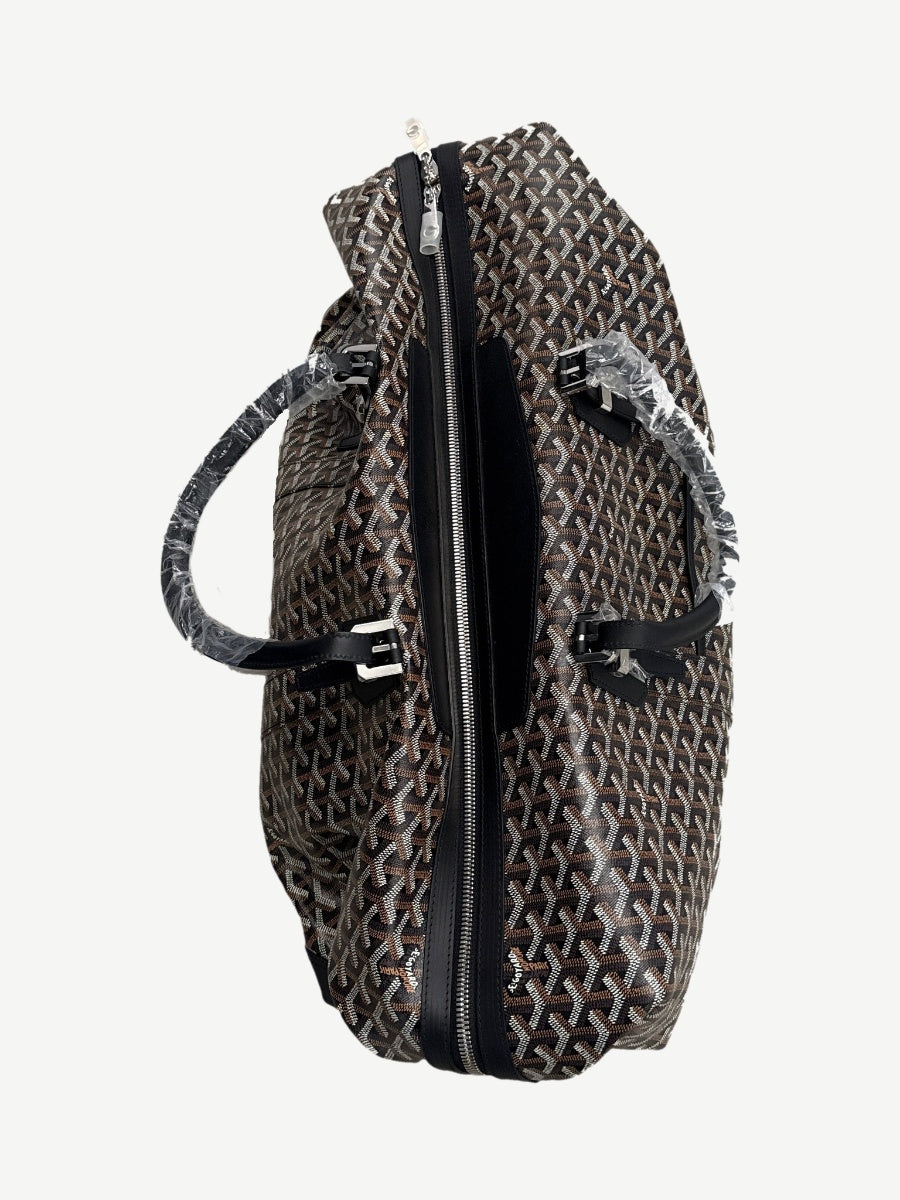 Goyard Boeing 55 duffle bag end panel showing leather trim, top handles and zipper closure detail