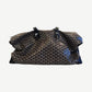 Goyard black and brown Boeing 55 duffle bag front view with signature Goyardine canvas chevron pattern