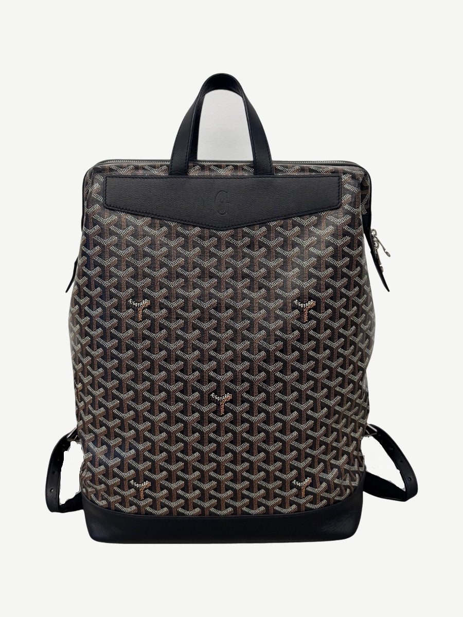 Goyard Cisalpin backpack in black Goyardine canvas with embossed leather top handle and dual side zippers