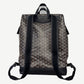 Goyard Cisalpin backpack rear view showing black leather adjustable shoulder straps over chevron canvas