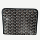 Side profile of Goyard black Jouvence GM toiletry pouch showing chevron Goyardine canvas and leather trim.