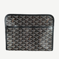 Goyard Jouvence GM toiletry bag in black Goyardine canvas with signature chevron print and zip top closure.
