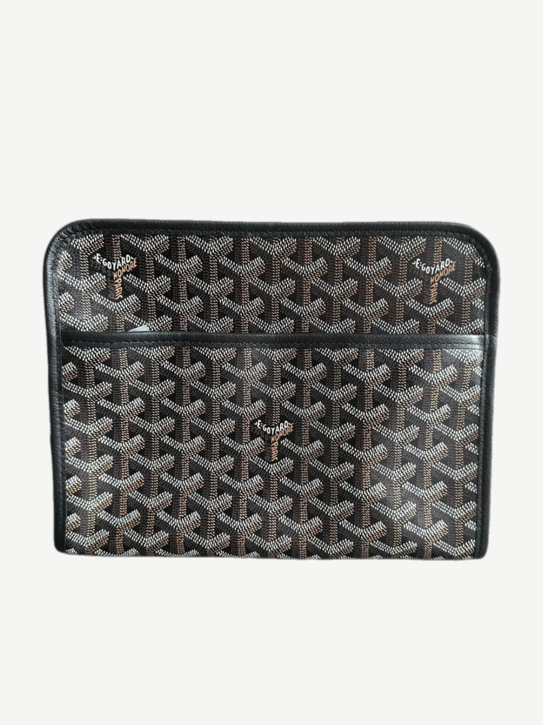 Goyard Jouvence GM toiletry bag in black Goyardine canvas with signature chevron print and zip top closure.