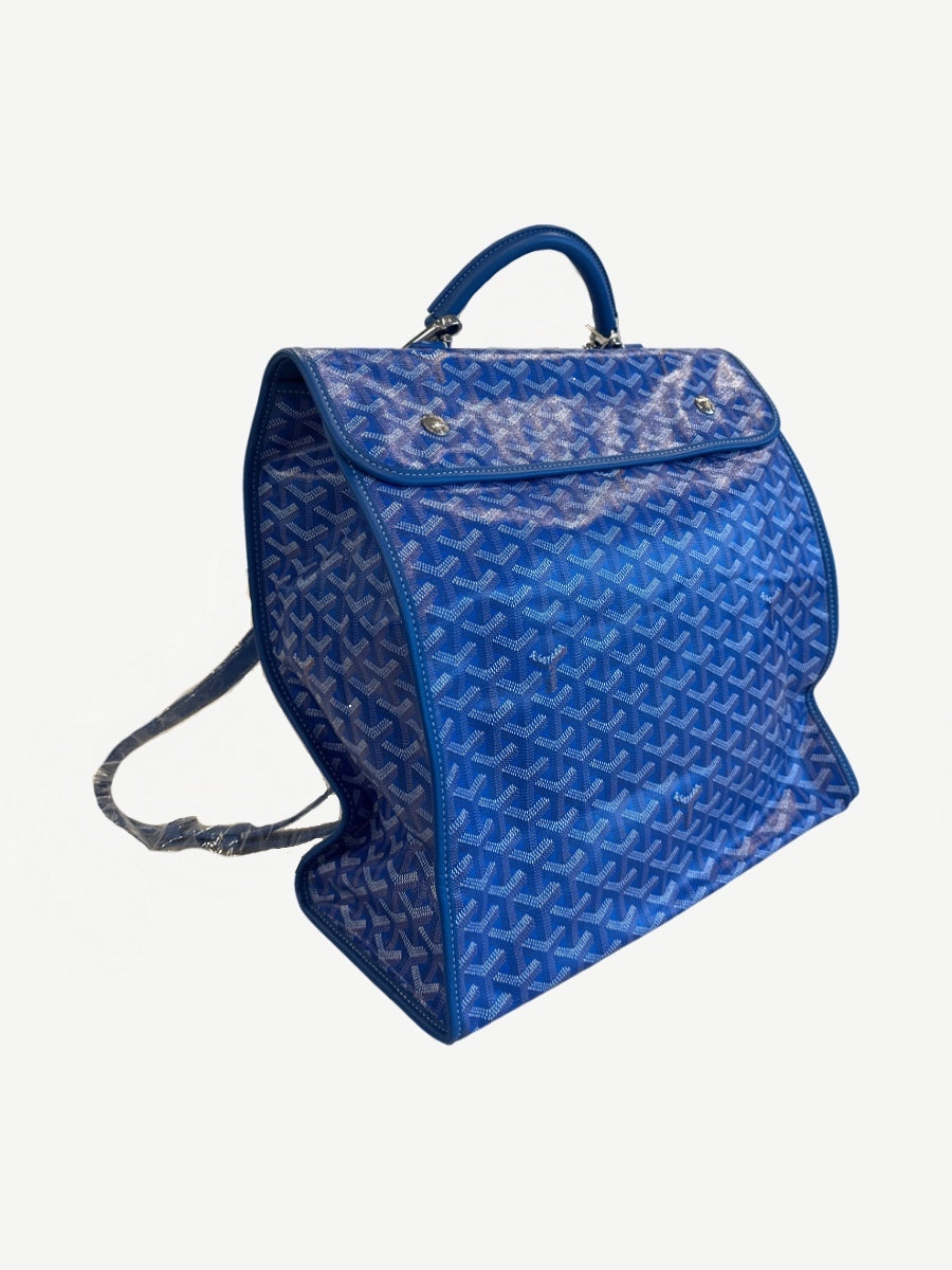 Goyard Saint Leger backpack rear three-quarter view in blue chevron canvas with leather-trimmed shoulder strap