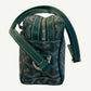 Goyard Cap Vert PM green Goyardine messenger bag side view with leather corners and adjustable strap