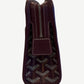 Goyard Jouvence PM toiletry pouch, maroon chevron coated canvas, rectangular silhouette with leather zip pull.
