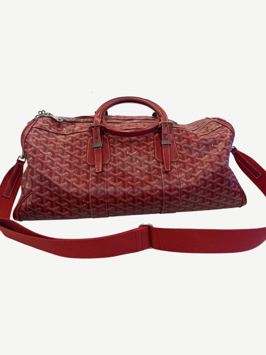 Goyard red Boeing 45 duffle with detachable woven shoulder strap and red leather trim accents