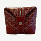 Goyard red Bowling 25 toiletry bag end view showing silver turn-lock and Goyard hardware