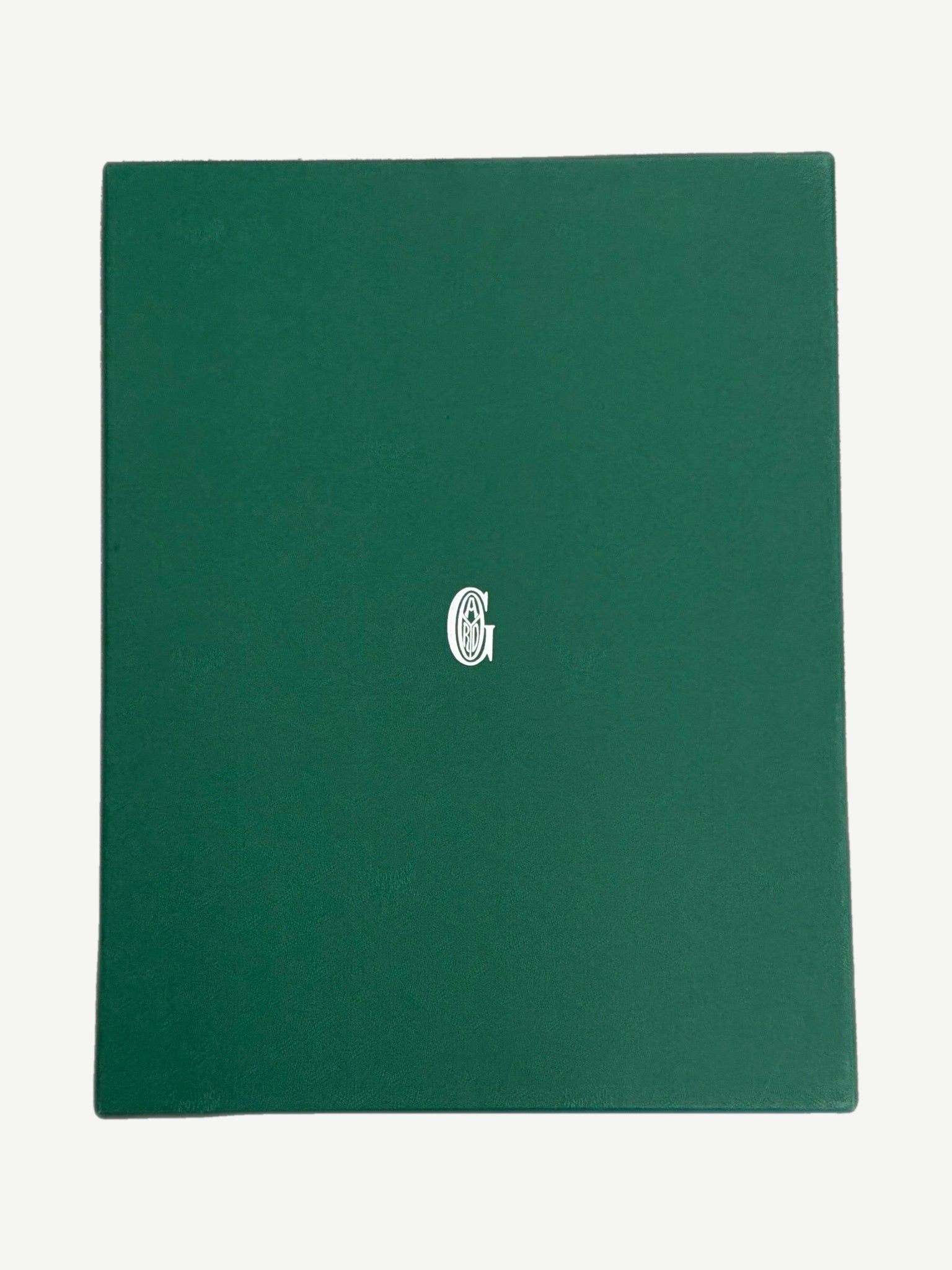 Goyard green leather presentation box with embossed white Maison Goyard monogram cartouche on lid.