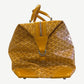 Goyard Boeing 45 yellow duffle bag end view with zipper closure, D-ring and yellow leather corner caps