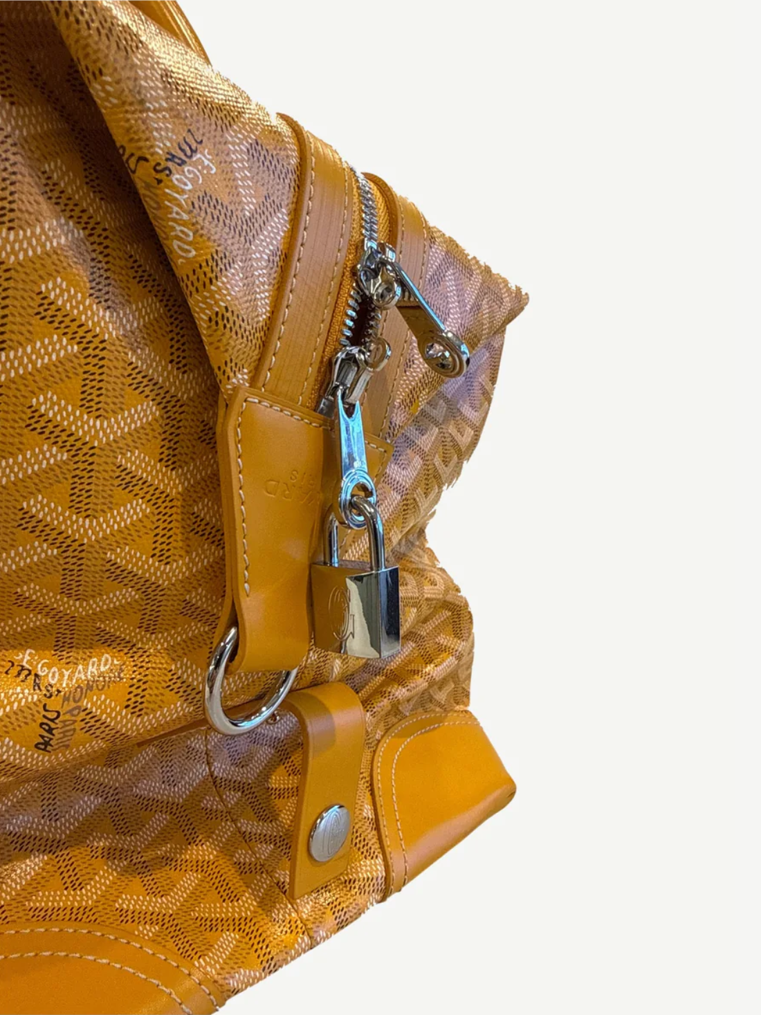 Goyard Boeing 45 yellow duffle close-up of silver zipper pulls and chevron monogram canvas detail